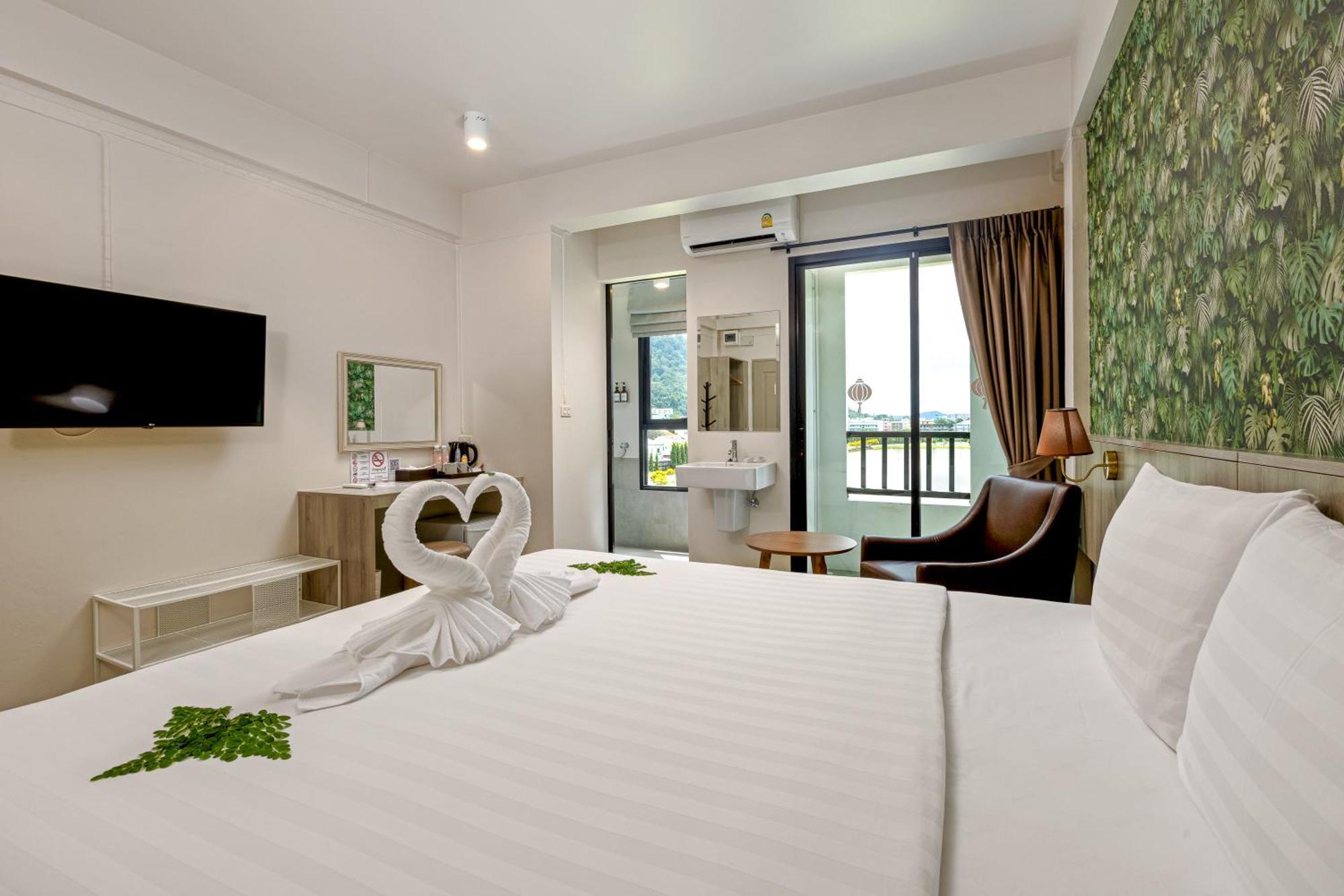 Ang Pao Hotel Phuket Bagian luar foto